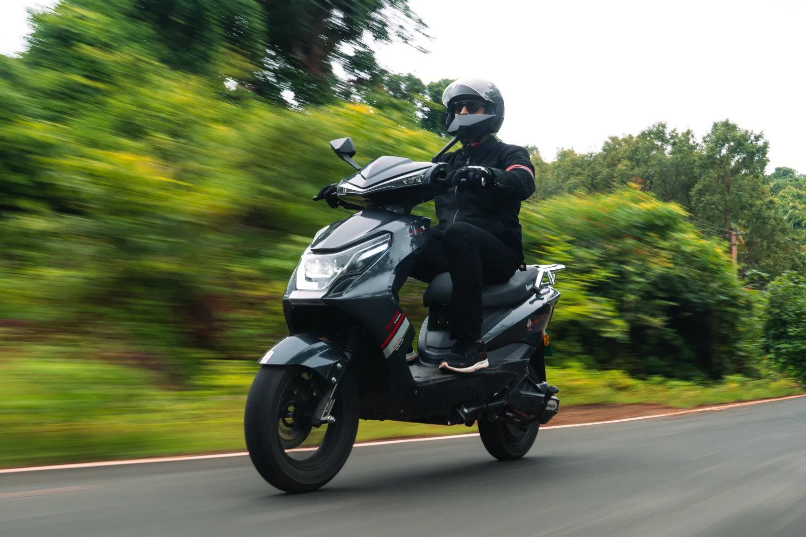A rider on the Tunwal Alfa Lite on an open road